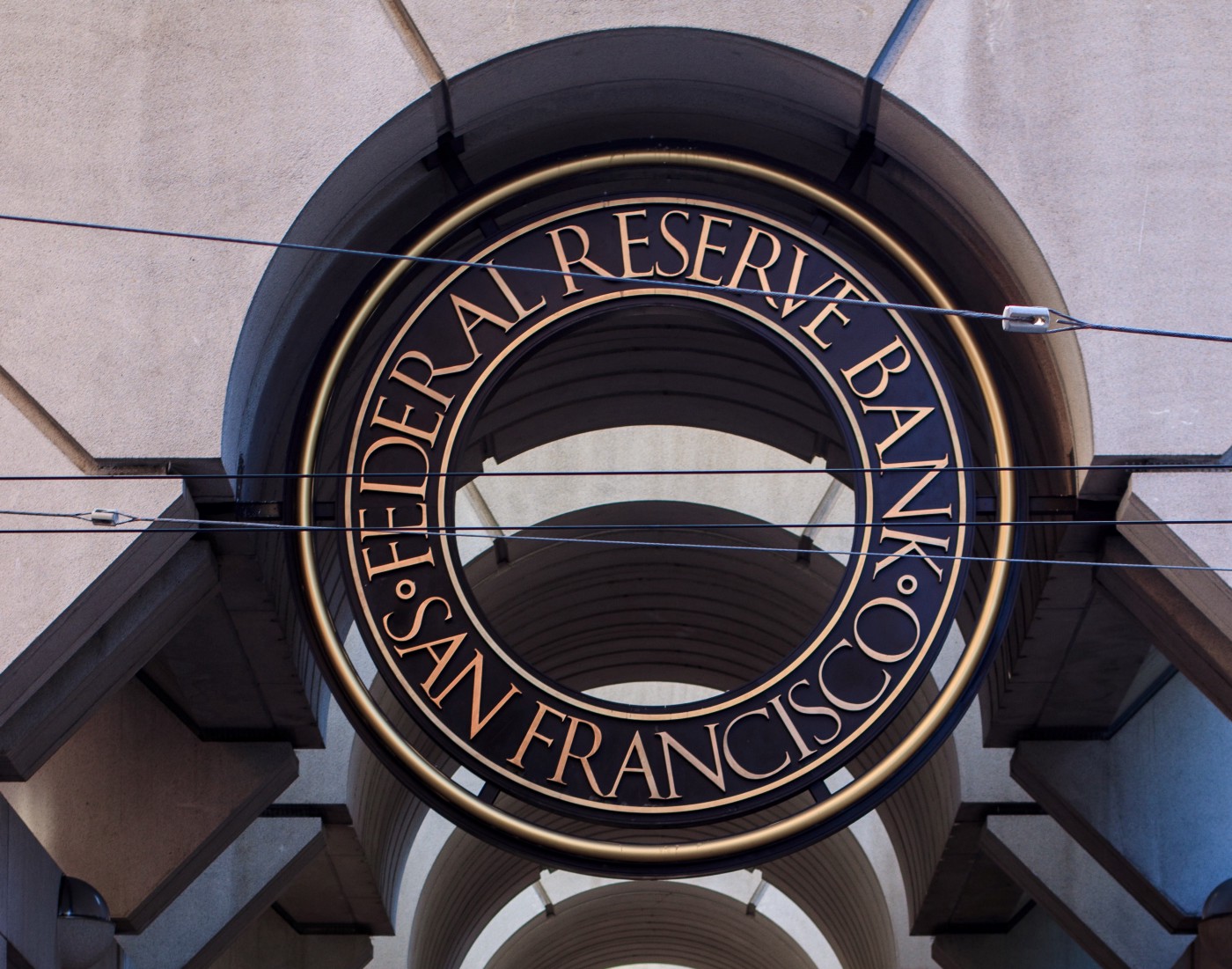 Photo of the Federal Reserve Bank of San Francisco’s seal on the outside of the building.